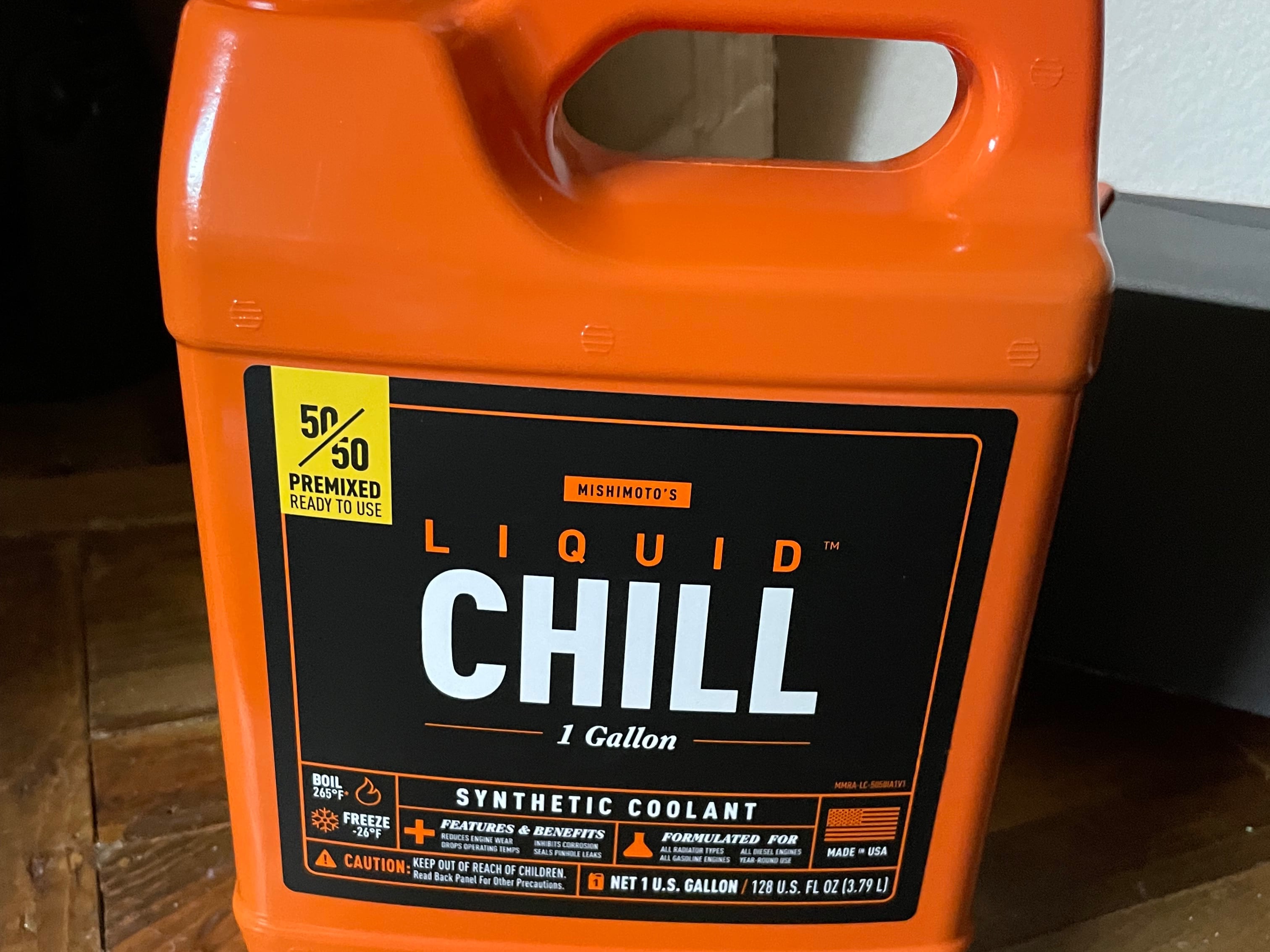 Container of Mishimoto Liquid Chill 50/50 premixed synthetic coolant, designed to provide freeze protection, corrosion resistance, and efficient engine cooling.
