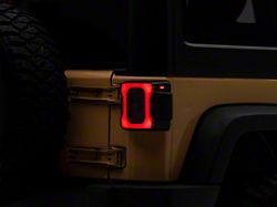 Raxiom Axial Series Carver LED Tail Lights; Black Housing; Smoked Lens (07-18 Jeep Wrangler JK)