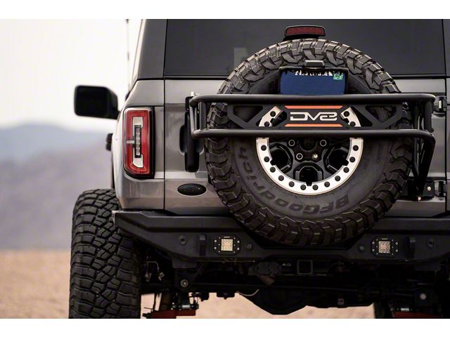 DV8 Offroad Spare Tire Guard and Accessory Mount (21-24 Bronco)