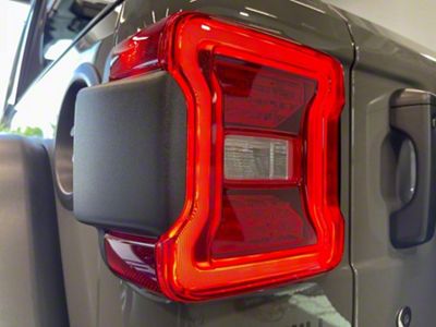 Infotainment Factory OEM LED Tail Lights; Black Housing; Red Lens (18-24 Jeep Wrangler JL w/ Factory Halogen Tail Lights)