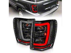 C-Bar LED Tail Lights; Black Housing; Clear Lens (99-04 Jeep Grand Cherokee WJ)