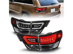 C-Bar LED Tail Lights; Black Housing; Clear Lens (11-13 Jeep Grand Cherokee WK2)