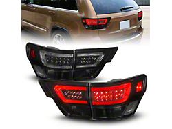 C-Bar LED Tail Lights; Black Housing; Smoked Lens (11-13 Jeep Grand Cherokee WK2)