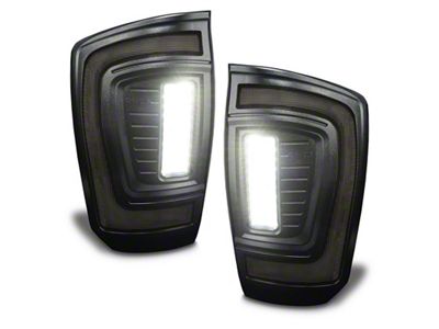 Oracle Flush Style LED Tail Lights; Black Housing; Smoked Lens (16-23 Tacoma)