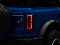 Raxiom Sequential LED Tail Lights; Black Housing; Smoked Lens (21-24 Bronco w/ Factory Halogen Tail Lights)
